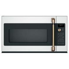 a white microwave oven with a gold handle