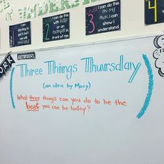 a white board with writing on it in front of a wall that says three things thursday