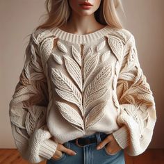 a mannequin wearing a white sweater and jeans with her hands in her pockets