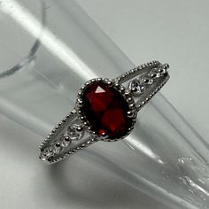 Oval 8x6mm Lab Created Ruby * Sterling Silver * Rhodium Plated * Lead N Nickel Free * Color May Vary. Gothic Garnet Engagement Ring, Garnet Silver Rings, Ruby Engagement Ring Aesthetic, Red And Gold Wedding Rings, Goth Proposal Ideas, Ruby And Silver Engagement Ring, Red And Silver Engagement Ring, Ruby Wedding Rings Silver, Unique Gothic Engagement Rings