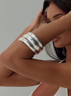 Silver-toned bangle pack Pack of three, fixed shape Princess Polly Lower Impact 100% reclaimed steel Bangle Outfit, Chunky Silver Jewellery, Coachella 2024, Womens Silver Jewelry, Silver Jewelry Box, Silver Bracelets For Women, Chunky Jewelry, Jewelry Lookbook, Sterling Silver Bangles