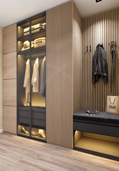 a walk in closet filled with lots of clothes and shoes next to a wall mounted coat rack