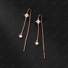 These elegant star dangle drop earrings ear threader features cable chain threaders with cubic zirconia stars dangle drop, made of solid 925 sterling silver with platinum or rose gold plating. Add these elegant star dangle threader to your everyday fine jewelry collection or as gift for your love one. Experience the luxury and sparkle of these threader earrings every day. Made from high-quality materials and featuring dazzling cubic zirconia stars, these earrings are sure to elevate your style a Elegant Dangle Earrings With Star Charm, Cubic Zirconia Star Charm Dangle Jewelry, Cubic Zirconia Dangle Jewelry With Star Charm, Sterling Silver Tarnish Resistant Dangle Threader Earrings, Sterling Silver Tarnish-resistant Dangle Threader Earrings, Tarnish Resistant Sterling Silver Dangle Threader Earrings, Tarnish-resistant Sterling Silver Dangle Threader Earrings, Sterling Silver Tarnish Resistant Drop Threader Earrings, Rose Gold Star-shaped Pierced Jewelry