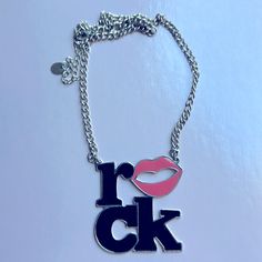 Black With Pink Lips With Adjustable Silver Chain. Trendy Personalized Black Necklace, Trendy Black Personalized Necklace, Black Rock Jewelry, Edgy Adjustable Pink Jewelry, Adjustable Edgy Pink Jewelry, Pink Punk Necklace For Party, Pink Punk Style Necklace For Party, Rock Style Metal Jewelry For Party, Trendy Necklace For Concert