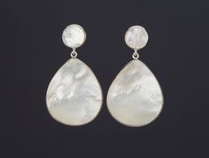 This pair of two tier Mother of pearl earrings would be great reward for yourself or a great gift for your mother or best friend. It has a small round MOP top in gold bezel and a very large MOP pendant at the bottom 1. Stone : Mother of pearl ( 11mm top, 37 x 26 mm pendant) 2. total length: about 51 mm 3. bezel material: gold vermeil or sterling silver 4. earring post: gold vermeil or sterling silver 5. an optional custom jewelry card printed with your own message, if you are sending these as a Handmade Elegant Teardrop Earrings For Anniversary, Elegant Handmade Teardrop Earrings For Anniversary, High Luster Drop Earrings For Gift, Teardrop Mother Of Pearl Earrings For Formal Occasions, Pearl White Drop Clip-on Earrings As Gift, Pearl White Drop Clip-on Earrings For Gift, Anniversary Mother Of Pearl Round Earrings, White High Luster Earrings For Anniversary, Pearl White Clip-on Earrings With Pearl Drop For Gift