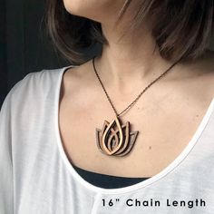 ★.  GET 20% OFF  .★Go to promo.alysonprete.com/code20LOTUS FLOWER NECKLACEPendant size: 2x2Chain length:- 16" + 2" extender- 18" + 2" extender- 24" + 2" extender **Message me for custom length**Gunmetal Alloy Chain with a lobster clasp. (Cadmium, nickel, and lead-free) Every piece of wood is different, the grain in your jewelry may differ slightly from the wood in the photograph.Water resistant. Not recommended to wear in shower. SHIPPING• Orders take between 1-3 days processing before shipment. Bohemian Carved Necklace For Gift, Elegant Laser Engraved Pendant Jewelry, Spiritual Engraved Flower Pendant Necklace, Spiritual Brown Carved Necklace, Wood Necklace Pendant, Laser Cut Wood Pendant Necklace, Wood Hoop Earrings, Lotus Flower Necklace, Jewelry Wood