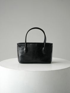 Composition : Outer Fabric (Polyurethane) Inner Skin (Polyester)Country of Origin : Republic of Korea Modern Black Square Satchel, Black Faux Leather Bag For Formal Occasions, Black Square Box Bag For Daily Use, Large Capacity Black Box Bag For Formal Occasions, Black Box Bag With Large Capacity For Formal Events, Black Formal Tote Box Bag, Black Faux Leather Evening Bag, Black Square Satchel With Detachable Handle, Formal Black Tote Box Bag