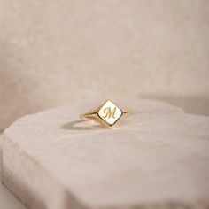 Personalized Ring 14K Solid Gold for Women - Initial Letter Signet Ring - Christmas Gift Write your name initial or your beloved's one. 100% handcrafted with love! ● Metal: 14K Solid Gold, 14K Solid White Gold ● Choose from the drop down menus the available option (Ring Size, Metal) and leave us a note for any special requirements. ● All our pieces are delivered beautifully packaged and gift ready. The gift wrap consists of a jewelry box and a certificate of our workshop for the metal. ● We need 5 days at least for its production. If you need your order on a specific date, please contact us. ●All orders are shipped worldwide via FedEx Express for speed and security. The estimated delivery time is 3 days to the US and Europe and 5 days to anywhere else. Instagram: https://www.instagram.com/ Shiny Jewelry, Daily Wear Jewellery, Letter Ring, Great Gifts For Women, Gold Signet Ring, Personalized Rings, White Gold Band, Initial Letters, Signet Ring