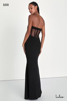 Heads are sure to turn when you walk in wearing the Lulus Iconic Arrival Black Strapless Bustier Mermaid Maxi Dress! Stretchy, crepe-knit fabric shapes this dramatic dress that has a bustier-inspired bodice with hidden supportive boning and no-slip strips. Pleated details decorate the front, while the back boasts sheer mesh panels for an eye-catching accent. Fitted waist tops a figure-skimming mermaid skirt that finishes at a maxi hem. Hidden zipper/clasp at back. Fit: This garment fits true to Fitted Evening Corset Dress With Boning, Evening Stretch Bandage Dress, Strapless Fitted Evening Dress, Elegant Sleeveless Bandage Dress With Boned Bodice, Fitted Strapless Dress With Boned Bodice, Sleeveless Evening Bandage Dress, Formal Sleeveless Bandage Dress With Fitted Bodice, Elegant Strapless Mermaid Dress For Evening, Fitted Gown With Flattering Silhouette For Gala