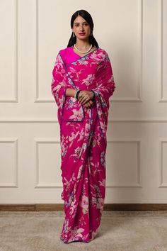 Hot pink saree featuring floral print with contrast blue piping on the hem. Comes with an unstitched blouse piece. - Aza Fashions Fitted Pre-draped Saree With Floral Print For Festive Occasions, Fitted Floral Print Pre-draped Saree For Navratri, Georgette Pre-draped Saree With Floral Print, Traditional Pre-draped Saree With Floral Print For Eid, Traditional Floral Pre-draped Saree For Eid, Unstitched Blouse With Floral Print And Traditional Drape, Navratri Silk Pre-draped Saree With Floral Print, Navratri Printed Pre-draped Saree, Diwali Floral Print Fitted Pre-draped Saree