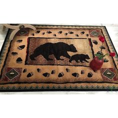 the bear and cub rug is on display