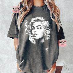 Blondie Y2k T-Shirt, Vintage 90s Style Shirt, Cute Soft Distressed Tee, Unisex Oversized Washed Y2k Shirt, Gothic Baggy shirt, Gothic Gifts 90s Style Graphic T-Shirt, Retro Raccoon Shirt, Trendy Shirts, Adult Unisex Relaxed Shirt, Washed Tee Browse our selection of more shirts/sweatshirts ------ https://www.etsy.com/shop/KenzAmericanTee?ref=seller-platform-mcnav NOTE: We use Comfort Color tees for Vintage Distressed and Grey Distressed             We use Gildan tees for all other colors. ✿ Shirt Oversized Y2k T-shirt With Screen Print, Grunge Tops With Funny Print For Summer, Oversized Y2k T-shirt With Short Sleeves, Summer Grunge Tops With Funny Print, Trendy Acid Wash Tops For Streetwear, Trendy Acid Wash Tops With Sublimation Print, Trendy Acid Wash Top With Sublimation Print, Oversized Graphic Print Grunge Tops, Vintage Black Top With Funny Print