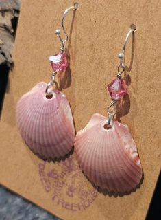 Scallop shells gathered on Sanibel Island were coated in sparkly resin and prepared for wire wrapping. The pink shell earrings are accented with pink Swarovski crystals. Pink Swarovski, Scallop Shell, Sanibel Island, Scallop Shells, Shell Earrings, Beach Bum, Dream Jewelry, The Pink, Amazing Jewelry