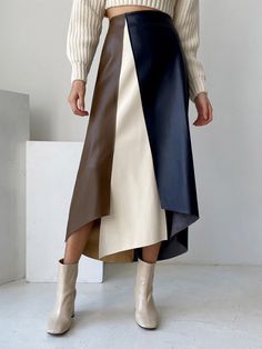 Chic Asymmetrical Patchwork Skirt, Fall Patchwork Asymmetrical Skirt, Chic Irregular Skirt, Chic Fall Patchwork Skirt, Asymmetrical Fitted Brown Skirt, Chic Irregular Skirt For Spring, Chic Patchwork Skirt For Fall, Brown Asymmetrical Hem Skirt For Fall, Fall Brown Skirt With Asymmetrical Hem