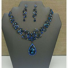 New Unused Cubic Zirconia And Australian Crystal Necklace Set. Matching Earrings Have Post Backings And Are Lightweight. This Necklace Is A Beautiful Breathtaking Piece To Enjoy For Years To Come. This Set Is Unique Because It's Rare To Find A Navy Blue Crystal And Cubic Zirconia Combination. Formal Crystal Jewelry Sets With Jeweled Details, Formal Jeweled Crystal Jewelry Sets, Formal Crystal Jeweled Jewelry Sets, Blue Teardrop Jewelry With Diamond Accents, Blue Teardrop-shaped Jewelry With Diamond Accents, Elegant Sapphire Jewelry Sets For Party, Blue Cubic Zirconia Teardrop Jewelry Sets, Blue Teardrop Cubic Zirconia Jewelry Sets, Sapphire Cubic Zirconia Jewelry For Evening