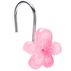 a pink flower shaped glass hook on a metal bar with a ball attached to it