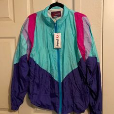 New With Tags 80s Early 90s Warm Up Jacket By Celebrity Made In China Vintage Colors Jacket Is Lined In Excellent Condition 90s Inspired Long Sleeve Fall Outerwear, 90s Spring Outerwear, 90s Nylon Windbreaker For Fall, 90s Nylon Track Jacket For Fall, 90s Style Nylon Long Sleeve Windbreaker, 90s Style Nylon Track Jacket For Fall, Vintage Nylon Windbreaker For Spring, Retro Nylon Windbreaker For Fall, Retro Long Sleeve Nylon Outerwear