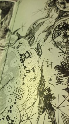 an intricately designed paper with black ink