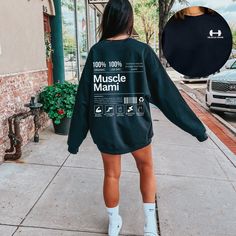 Introducing the Muscle Mami Crewneck, the ultimate statement piece for all the gym baddies out there! Designed with powerlifting and weightlifting in mind, this gym tee is perfect for those who want to express their strength and confidence. .: Made with a medium-heavy fabric blend of 50% cotton and 50% polyester (8.0 oz/yd² (271.25 g/m this sweatshirt feels cozy and is the perfect choice for those colder months. .: The classic fit along with the crew neckline deliver a comfy wearing experience with a clean-cut style. Meanwhile, the double-needle stitching at the shoulder, armhole, neck, waistband, and cuff seams add top-tier durability.  .: Say goodbye to itchiness thanks to the gray, pearlized tear-away label.  .: Made using 100% ethically grown US cotton. Gildan is also a proud member of Black Graphic Print Sweatshirt For Gym, Workout Sweatshirt With Letter Print For Sports Season, Letter Print Sweatshirt For Sports Season Workout, Sweat-resistant Gym Sweatshirt, Black Activewear For Workout With Text Print, Sportswear Gym Sweatshirt Sweat Resistant, Black Letter Print Sweatshirt For Gym, Sporty Workout Sweatshirt, Sweat Resistant, Sweat-resistant Sportswear Sweatshirt For Workout