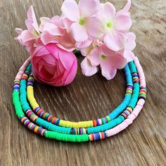 "Colorful Heishi Surfer Choker/ Necklace You will receive 1 trendy summer Heishi necklace similar to one pictured, handmade to order just for you 🌊 ❤️ Made of Heishi beads, lightweight, waterproof and stylish, the perfect way to complete your summer look or add some \"summer vibes\" to any day of the year. 💕 Made with hypoallergenic clasps to all for long lasting, tarnish free wear. Order one to rock on its own or 2 or 3 for a stylish stacked look 🦋 No 2 necklaces are exactly alike. Special r Golf Necklace, Summer Jewelry Beach, Pink Bead Necklace, Surfer Jewelry, Bracelets Easy, Heishi Necklace, Braid Jewelry, Dreadlock Beads, Beach Necklace