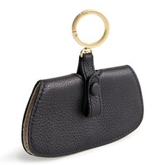 Make a statement wherever you go with our stylish sunglasses bag charm. Designed to add flair to your favorite handbag, backpack, or tote, this charming accessory is a must-have for fashion-forward individuals. Not just a stylish accessory, our bag charm also serves a practical purpose. Simply clip it onto your bag and keep your sunglasses close at hand whenever you need them. No more digging through your bag to find your shades - with our charm, they're always within reach. Vera Bradley Sunglas Elegant Bag Charm For Everyday Use, Travel Bags With Key Clip, Versatile Everyday Bag With Key Leash, Elegant Rectangular Bag Charm, Black Bag With Key Clip For Everyday Use, Trendy Bag Charm With Key Clip For Everyday Use, Black Bags With Key Clip For Everyday Use, Chic On-the-go Bag With Interior Key Chain Holder, Leather Bag Charm With Interior Key Chain For Travel