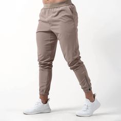 performance jogger taupe front Logo Placement, Keep Cool, Mens Joggers, 4 Way Stretch Fabric, Keep Your Cool, Cross Training, Hip Length, Easy Wear, Weight Lifting