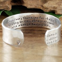 "Take a LOOK at our Website: ANNIEREH.com Personalized Grandma Bracelet, Grandmother Cuff Bracelet, Grandchildren's Names, Mothers Day Gift, Gift for Grandma,Christmas Gift for Her Customize our cuff bracelets with your favorite word/s, meaningful phrase, special saying, names of loved ones, grandchildren, dates and even coordinates for the place you met your partner or shared a special moment with someone. Let us know the Names/Wording for this cuff in our NOTE to seller box. We can also person Adjustable Bangle As A Gift, Meaningful Handmade Bracelets For Mother's Day, Handmade Meaningful Bracelets For Mother's Day, Mother's Day Bracelet Gift For Mom, Handmade Adjustable Cuff Bracelet For Anniversary, Adjustable Bangle Cuff Bracelet For Gift, Adjustable Bangle Cuff Bracelet As Gift, Mother's Day Gift Adjustable Name Bracelet, Engraved Bracelets For Birthday And Mother's Day