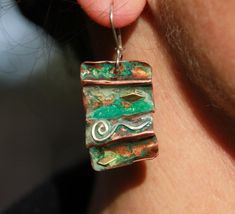 Copper Earrings Handmade Rustica Jewelry, Cheap Blue Copper Earrings, Unique Luxury Jewelry With Patina, Luxury Bohemian Jewelry With Patina, Luxury Antique Jewelry With Patina, Copper Polymer Clay Earrings, Luxury Brass Jewelry With Patina, Luxury Collectible Patina Jewelry, Copper Cuff