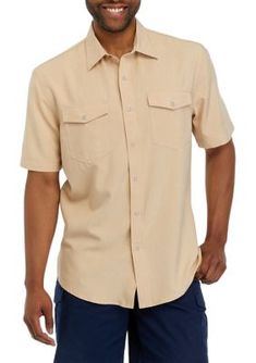 Classic and versatile, this solid button-down shirt from Ocean + Coast is finished with short sleeves, a point collar, and two pockets along the chest. | Ocean + Coast Men's Short Sleeve Chambray Western Button Down Shirt, Tan, Medium Solid Color Button-up Camp Shirt With Placket, Solid Button-up Camp Shirt With Buttons, Classic Short Sleeve Shirt With Flap Pockets, Button-up Camp Shirt With Pockets, Solid Color Short Sleeve Button-up Shirt, Solid Color Button-up Short Sleeve Shirt For Business Casual, Solid Short Sleeve Button-up Shirt For Business Casual, Solid Button-up Short Sleeve Shirt For Business Casual, Summer Business Casual Short Sleeve Shirt With Pockets