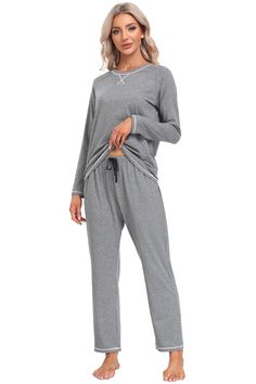 Material: 91% Polyester, 9% Spandex Material characteristics： 91% Polyester, 9% Spandex. Womens pajama set were made of lightweight, stretchy, soft and skin-friendly fabric, keep you relaxed while sleeping at night and enjoy superior comfort. Features: The long sleeve pajama tops with round neck & front fashion design, simple but elegant, perfect for house or daily wear on cooling day. Full length pajama pant with elastic waistband, features loose fit to offers you tummy support, allowing more freedom to move or rollover in the bed and making you as comfortable as possible.2 side pockets can Can store mobile phone. Occasion: The sleepwear is perfect as a Christmas, Valentine's Day, Mother's Day, New Year's Day, anniversary and birthday gift for your mom, wife, daughter, girlfriend or frien Cozy Sleepwear With Pockets For Loungewear, Cozy Loungewear Sleepwear With Pockets, Sleepwear With Pockets, Comfy Sleepwear With Pockets For Loungewear, Sleepwear With Pockets For Loungewear, Loungewear Sets With Pockets, Gray Loungewear Sets With Pockets, Comfortable Solid Color Sleepwear With Pockets, Comfortable Solid Sleepwear With Pockets