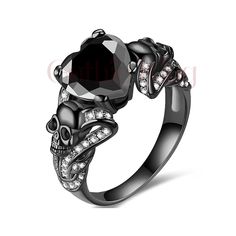 GOTHICKING OFFERS YOU VERY UNIQUE & ANTIQUE GOTHIC SKULL JEWELLERY WITH MULTI-COLOR METAL, LIKE YELLOW, ROSE, AND WHITE GOLD FINISH. WE OFFER CUSTOM JEWELLERY LIKE, METAL CHANGE, ENGRAVING AND GIFT CARD ETC. PRODUCT DESCRIPTION: Metal : Sterling Silver Metal Purity : 925 Metal Finish: Black Rhodium Finish Main Stone Color :  Black Main Stone Shape : Round Total Carat Weight : 2.50 Ct Main Stone : Lab Sapphire Cut Grade : Excellent Available Metal: White/Yellow/Rose Gold Finish Gothic rings are o Gothic Skull Ring With Polished Finish, Gothic Gold Heart-shaped Jewelry, Gothic Black Skull Ring, Black Gothic Stainless Steel Skull Ring, Gothic Skull Ring Collectible, Skull Wedding, Custom Jewellery, Wedding Engagement Ring, Black Sapphire