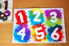 the numbers are painted on paper and placed next to each other