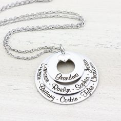 Personalized jewelry is an especially delightful gift for mothers, grandmothers, and ladies who appreciate personal touches. This mom or grandma necklace is a great idea for Mother’s day, but you really don’t need a reason or a holiday to treat your mother to a sentimental gift. At HeartfeltTokens, our necklaces are expertly engraved and made with high-quality stainless steel to ensure a timeless design that won't fade over time.All of our items are 100% designed, engraved, and shipped to you from our home studio in Florida, so I thank you for supporting our small business ❤ INCLUDES: sterling silver heart charm 3/4" stainless steel washer - up to 2 names 1" stainless steel washer - up to 4 names 1 1/4" stainless steel washer - up to 5 names stainless steel necklace chain of your choice Ou Mother's Day Round Engraved Name Necklace, Grandma Necklace Personalized, Engraved Necklace For Anniversary, Mother's Day, Mother's Day Personalized Name Necklace With Hallmarks, Hand Stamped Necklaces For Wedding/mother's Day, Grandmother Necklace, Grandma Necklace, Unique Handcrafted Jewelry, Name Jewelry