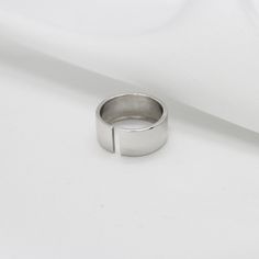 Dimensions Ring width: 8mm Wide wedding ring in 925 sterling silver. Excellent wide slotted ring that allows you to adjust it exactly to your finger size. This ring can be used both as an engagement ring and for every day. Silver plated with rhodium, this protects the ring from wear and gives it a shine. Rhodium is harmless to the skin. Wedding Ring Wide Band - Sterling Silver Band Ring - Statement Ring - Open Band Ring - 925 Silver Wide Band Ring - Gift For Her - Minimalist Minimalist Silver Stainless Steel Signet Ring, Minimalist Sterling Silver Wide Band Ring For Anniversary, Silver Minimalist Wide Band Ring For Anniversary, Minimalist Silver Wide Band Ring For Anniversary, Minimalist Silver Wide Band Ring Gift, Minimalist Sterling Silver Wide Band Ring, Minimalist Sterling Silver Couple Rings, Silver Minimalist Wide Band Ring, Silver Minimalist Wide Band Signet Ring