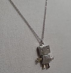 Tiny Robot Necklace Movable Joint Stainless Steel Pendant Charm Retro Punk Uniqu | eBay Cute Metal Clavicle Chain Necklace, Cute Metal Necklace With Dainty Chain, Cute Silver Jewelry With Adjustable Chain, Cute Silver Metal Necklace, Handmade Cute Silver Necklace, Cute Handmade Silver Necklace, Cute Metal Pendant Necklaces, Cute Metal Pendant Necklace, Cute Silver Choker Jewelry