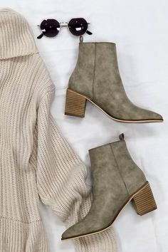 Pointy ankle bootie with low wooden heel. Zipper exposed on the outside ALL SHOES FINAL SALE. Trendy Chelsea Boots With Stacked Heel For Fall, Fall Chelsea Boots With Stacked High Heel, Fall Chelsea Boots With Stacked Heel, Fall Mid-calf Boots With Stacked Low Heel, Fall Booties With Stacked Heel, Low Heel Medium Width Heeled Boots For Fall, Ankle-high Booties With Stacked Heel For Fall, Casual Chelsea Boots With Block Heel For Fall, Medium Width Low Heel Boots For Fall