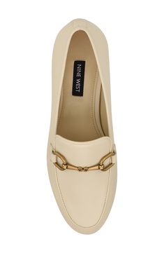 Polished bit hardware enriches the vamp of a sophisticated loafer fashioned with a classic moc toe for timeless appeal. Synthetic upper, lining and sole Imported The Vamp, Bit Loafers, Loafer Women, Loafers Style, The Vamps, Loafers For Women, Nine West, Loafers, Size 7