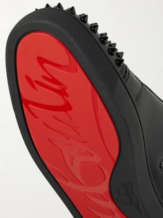 The 'Louis Junior' low-tops are a core design in Christian Louboutin's sneaker collection, and this 'Spikes' version perfectly melds the label's classic appeal and rock 'n' roll flare. They're made from smooth black leather, fitted with sleek tonal eyelets and laces, and finished with conical hardware on the toecaps. Wear them with slim, dark jeans. Louboutin Collection, Christian Louboutin Sneakers, Saint Laurent Jeans, Core Design, Sneakers For Men, Dark Jeans, Lace Fashion, Sneaker Collection, Mr Porter