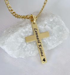 Our engraved gold Crosses are available with a range of chain lengths and different style. Our Gold Crosses have won praise from customers around the world. Check out our customer reviews. ITEM DETAILS: - 14 k gold over Sterling silver Cross. - 14 k gold filled and gold over sterling silver chains to be chosen from drop down menu. Need charms? http://etsy.me/1Njb7NM Classic Crosses  http://etsy.me/1JZ3tah Celtic Crosses  http://etsy.me/1Le9a5C Browse shop: https://www.MCACrossesJewelry.etsy.com It will be sent in a small gift box, silver or white. Chain drop down: Top chain Gold filled rolo    Middle chain Gold filled cable   Bottom chain Gold filled rope    Thank you very much for visiting our store. Cross-shaped Name Jewelry For Anniversary, Name-engraved Cross Jewelry For Anniversary, Anniversary Jewelry With Name And Cross Shape, Cross Pendant Jewelry With Name For Gift, Name Engraved Cross Pendant Jewelry For Gift, Name-engraved Cross Pendant Jewelry Gift, Name Engraved Cross Pendant Jewelry Gift, Name Necklace With Cross Pendant For Gift, Personalized Cross Pendant Jewelry Gift