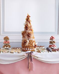 a table topped with lots of different types of cookies