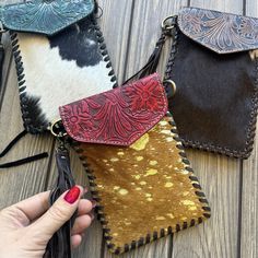 Carry your phone in style with this chic and trendy Phone Crossbody Western Cowhide Fringe Purse. Crafted with premium quality leather, this phone crossbody bag is the perfect accessory for keeping your phone and other essentials close at hand.  The compact size makes it an ideal choice for those who prefer a small leather purse or cell phone purse, while the stylish cowhide fringe adds a touch of Western charm to your outfit. With its adjustable crossbody strap, you can wear it comfortably for Trendy Leather Phone Bag With Cell Phone Pocket, Trendy Leather Phone Bag With Phone Pocket, Trendy Leather Phone Bag With Card Slots, Diy En Cuir, Small Leather Purse, Leather Wallet Pattern, Western Gifts, Old Boots, Far West