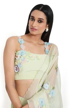 Mint green pre-draped saree with a detachable pallu, floral applique embroidery and a scalloped trimmed edge. Paired with a mint green blouse with floral applique work. - Aza Fashions Green Sleeveless Pre-draped Saree For Festive Season, Green Georgette Top For Wedding, Festive Green Georgette Top, Elegant Green Georgette Tops, Pista Green Georgette Blouse With Traditional Drape, Green Georgette Blouse For Reception, Green Georgette Blouse With Traditional Drape, Green Georgette Party Tops, Traditional Drape Green Georgette Blouse