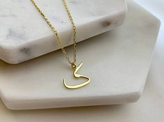 "This Farsi initial necklace ( Persian letter necklace) is perfect personalised gift for a mom, teenage girl, mother or daughter  birthday! Also, this personalised Farsi initial necklace would make a great gift for a bride, bridesmaid, grandma, girlfriend, best friend, baby shower, anniversary, wedding, engagement, graduation, valentine's day, bridal shower! Dainty, Farsi letter necklace has been produced with high quality 14k/8k solid gold or 925k solid silver and available in silver, gold, and rose gold colour.  FEATURES: * chain in different lengths * great for daily wear * hypoallergenic * nickel-free, lead-free & cadmium-free * handmade in the UK * arrives in gift box * can include your gift message (leave in Note to Seller at checkout) * free priority shipping within UK * internation Monogram Name Necklace In Tan As Gift, Monogram Tan Name Necklace For Gifts, Tan Monogram Name Necklace For Gift, Handmade Initial Pendant Name Necklace As Gift, Handmade Initial Pendant Necklace For Personalized Gift, Gift Monogram Initial Necklace In Tan, Tan Monogram Initial Necklace For Gift, Tan Monogram Initial Necklace For Gifts, Tan Initial Pendant Charm Necklace As Gift