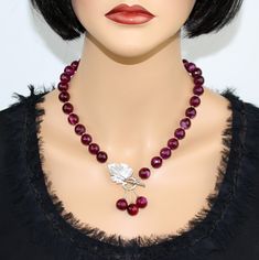 ♥ Ready to ship ♥ 100% handmade ♥ Packed in a gift box ♥ Custom length ♥ Gemstone: Genuine faceted ruby red agate   ♥ Bead size 10-12mm Add a touch of elegance to your outfit with this handmade ruby red agate lariat necklace. Featuring stunning natural agate stones in a rich ruby-red hue, this necklace is sure to make a statement.  The lariat design adds a modern twist. Whether worn with a casual tee or a sophisticated evening gown, this necklace is the perfect accessory to elevate any look.  Ha Lariat Necklace With Round Beads As Gift, Round Beads Single Strand Lariat Necklace As Gift, Garnet Necklaces For Gifts, Garnet Necklaces With Faceted Beads For Gifts, Garnet Bead Necklaces For Gifts, Garnet Beaded Necklaces As Gift, Garnet Round Bead Necklace For Gift, Garnet Round Beads Jewelry For Gifts, Elegant Red Crystal Necklaces With Natural Stones