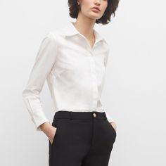 Intricate Pointelle Stitches Elevate A Classic Button-Down Shirt. This Slim-Fit Signature Is Designed To Be Your Wardrobe’s Workhorse, Pairing With Nearly Every Pant You Own, Now And In The Future. Model Is 5’10.5” Wearing A Size S Designed For A Sleek, Softly Tapered Fit That’s Just Right For Tucking. 96% Cotton; 4% Elastane Slim Fit With A 25¾” Length; Based On A Size M Front Button Placket Spread Collar; Long Sleeves With Single-Button Barrel Cuffs; Back Shoulder Yoke; Pointelle-Stitched Trim Timeless Button-up Office Tops, Timeless Button-up Blouse For Business Casual, Timeless Office Blouse With Button Closure, Timeless Office Blouse With Buttons, Classic Workwear Blouse With Button Closure, Timeless Workwear Shirt, Timeless Collared Tops For Work, Timeless Tops With Button Cuffs For Work, Classic Blouse With Button Closure For Work