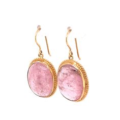 These breathtaking Mid-Century earrings feature pink tourmaline gemstones in 18 karat yellow gold. Two (2) 12.11 carat tourmalines, each with a rose pink hue, are set in engraved bezels. Photogenic and fabulous! Shop More Drop Earrings. Mid Century Earrings, Opal Earring, Tourmaline Earrings, Metal Shop, Tourmaline Gemstone, Shop Engagement Rings, Pink Opal, Pink Tourmaline, Rose Pink