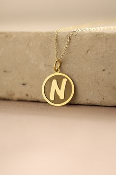 Gold Initial Pendant - Initial Gold Necklace ● Material of pendant: Solid Gold 14k ( REAL GOLD ) ● Metal Stamp: 14k ( REAL GOLD ) ● The pendant is available in 5 sizes: - 12,7 mm / 0.5 inches (Diameter) - 14,0 mm / 0,55 inches ( Diameter ) In the photos - 15,3 mm / 0.6 inches ( Diameter ) - 16,5 mm / 0,65 inches ( Diameter ) - 19,1 mm / 0,75 inches ( Diameter ) ( In the photos the size is 14mm / 0.55 inches Diameter ) ( Jump Ring inner diameter: 4 mm ) ● Material of chain: Solid gold 14k ( REAL Yellow Gold Round Pendant Necklace With Name, Yellow Gold Name Pendant Charm Necklaces, 14k Gold Name Necklace With Round Shape, 14k Gold Round Necklace With Name Detail, 14k Gold Round Necklace With Name, Yellow Gold Name Jewelry In Round Shape, Yellow Gold Name Jewelry, Round Shape, Yellow Gold Round Name Jewelry, Yellow Gold Round Jewelry With Name