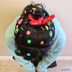 the back of a woman's head with sprinkles on it