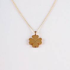 With the Clover Design 14K Gold Necklace for Women and Girls, available in an array of captivating colors, the promise of timeless elegance and romantic charm will soon elevate your accessory collection. This necklace will effortlessly combine sophistication with a touch of whimsy, thanks to its intricately crafted clover motif. Symbolizing good fortune and new beginnings, it will become a cherished piece that enhances any outfit with its delicate design and vibrant color options. Whether marking a special occasion or simply adding a stylish flair to your everyday look, this necklace will bring both joy and a hint of luxury to your ensemble. As you wear this elegant piece, its exquisite craftsmanship and versatile design will make it a standout accessory, perfect for various occasions and Classic Rose Gold Plated Charm Necklaces, 14k Gold Flower Pendant Charm Necklace For Anniversary, Formal White Gold 14k Charm Necklaces, Classic Gold Charm Necklaces With Polished Finish, Gold Flower Pendant Charm Necklace In 14k, Classic 14k Gold Necklace Gift For Her, Yellow Gold Necklace With Flower Pendant For Anniversary, Gold Charm Necklaces For Formal Occasions, Elegant 14k Stamped Yellow Gold Charm Necklaces