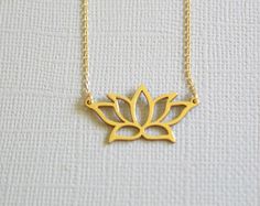 ✔️The most unique jewelry you can find, a perfect gift for you and your loved one. PRODUCT OVERVIEW Lotus Plant Gold Sterling Silver Charm Necklace Pendant Weight 0.096 oz (0.84g), Length 14.1mm (0.55 in) and Width 26.6mm (1.05 in)  It fits 41cm-46cm (16.1 inches to 18.1 inches) Adjustable Chain  Good for sensitive skin  Makes a great gift for any Anniversary, Engagement, Wedding, Birthday, Holiday, Promise, Graduation, Valentine's, or Special Occasion! LOTUS:  The meanings of the lotus flower, this plant is known to be associated with rebirth. This magnificent flower emerges from the dirty and unclean bottom of a pond but still remains untouched and unstained by the dirt and mud surrounding it in the pond. This unique quality of the flower is believed to represent the pure spirit, rebirth Minimalist 16-inch Jewelry As A Gift, Delicate Jewelry For Gifts, Small Minimalist Necklace As A Gift, Small Minimalist Necklace Perfect For Gifts, Delicate Small Jewelry Gift, Minimalist Small Necklace Perfect For Gifts, 16 Inch Yellow Gold Jewelry As A Gift, Small Minimalist Necklace For Gift, Gift Jewelry In Yellow Gold, 16 Inch Length